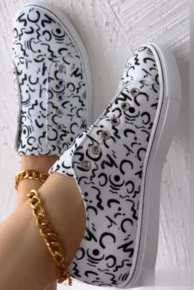 Graffiti Eyelet Slip-On Sneakers