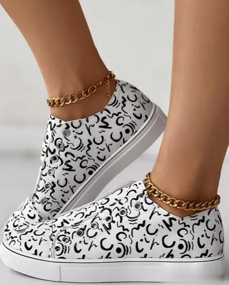Graffiti Eyelet Slip-On Sneakers